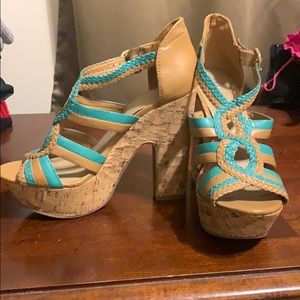 Nearly new turquoise leather BCBG Platforms